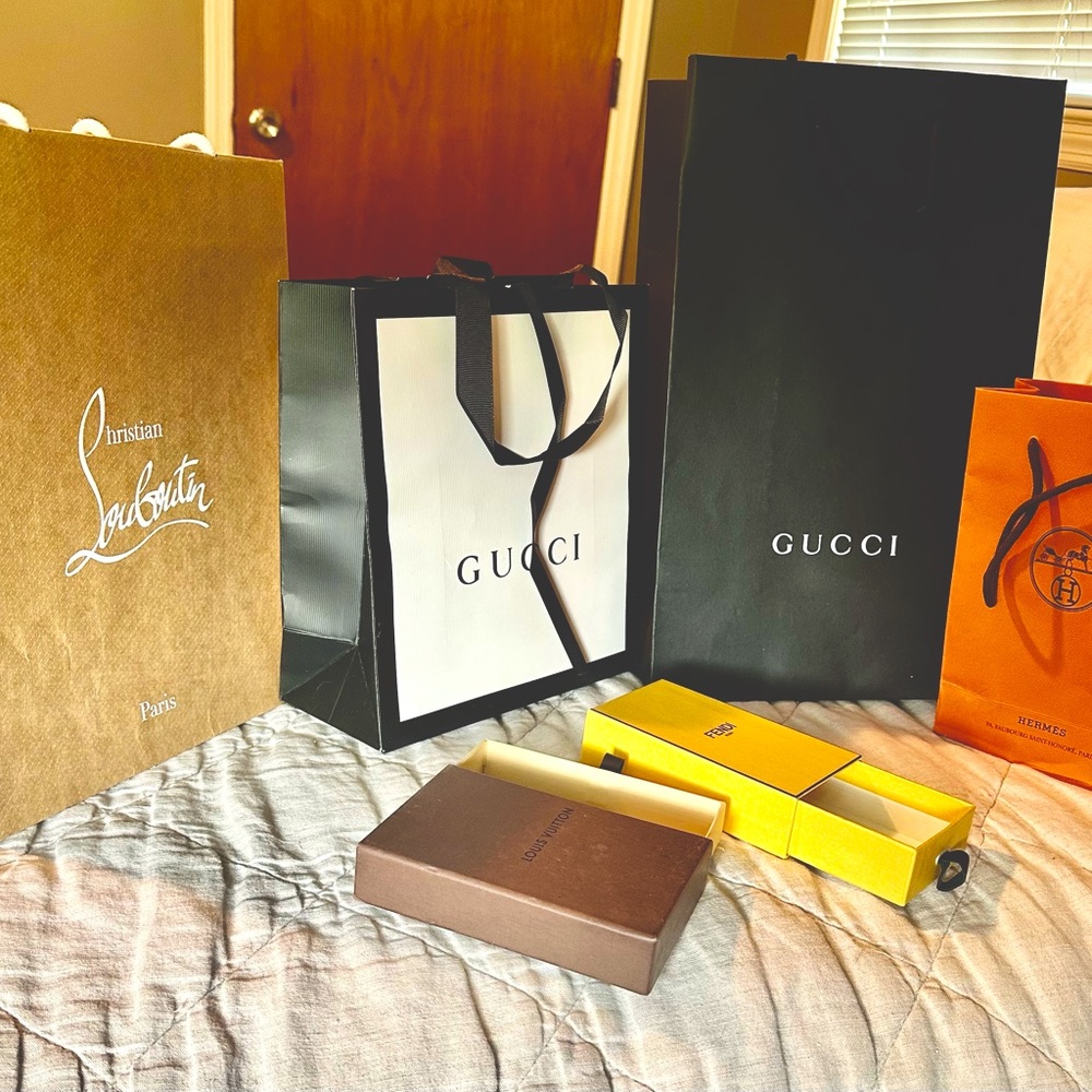 4 designer gift bags and two designer slide gift boxes.